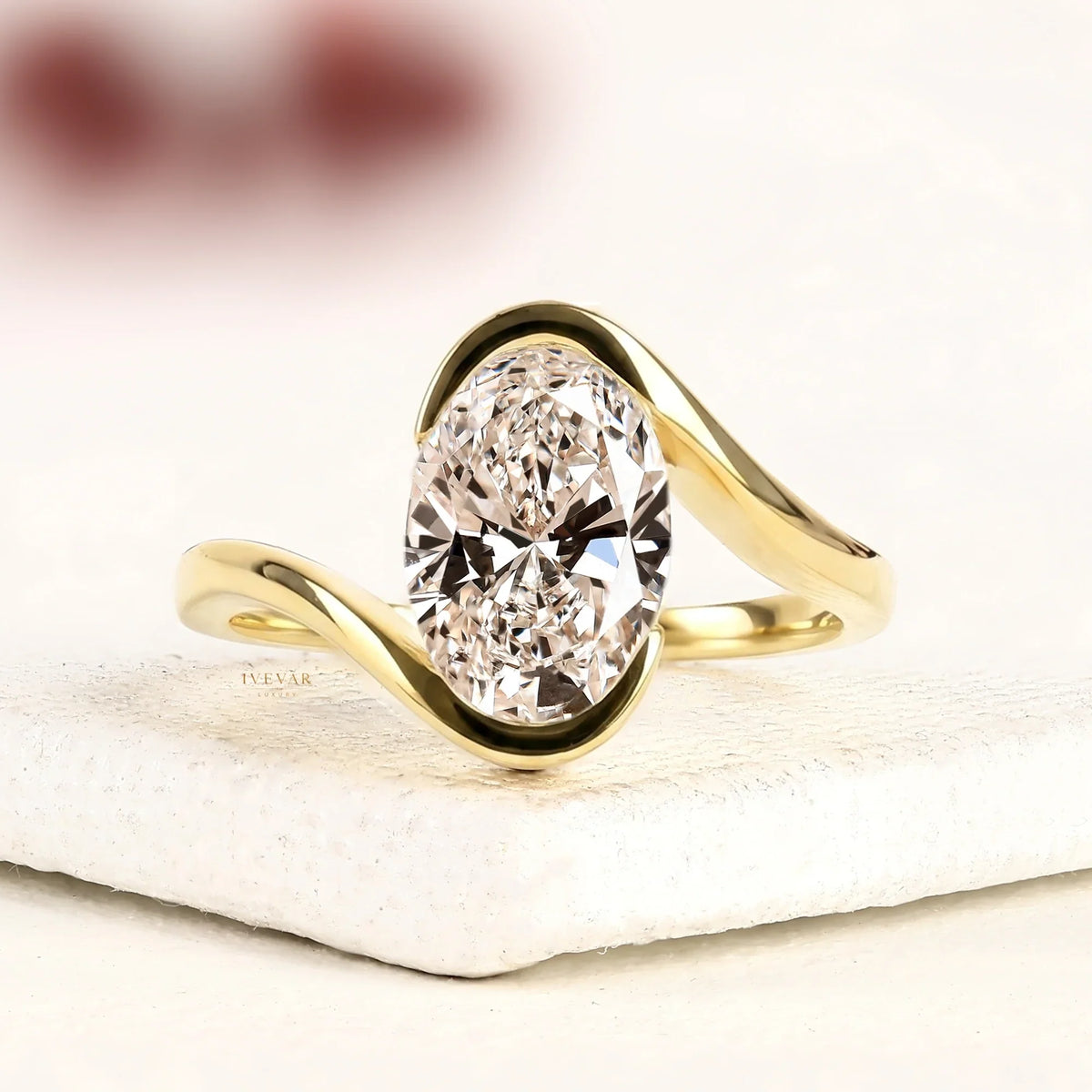 oval cut lab diamond bypass ring with half bezel setting