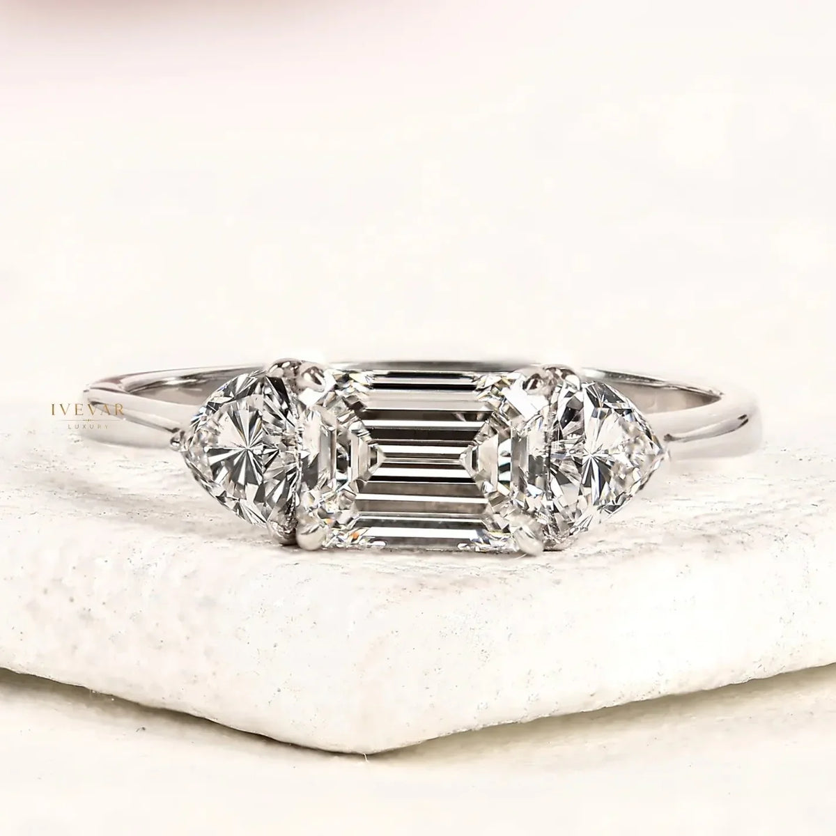emerald cut three stone moissanite diamond ring