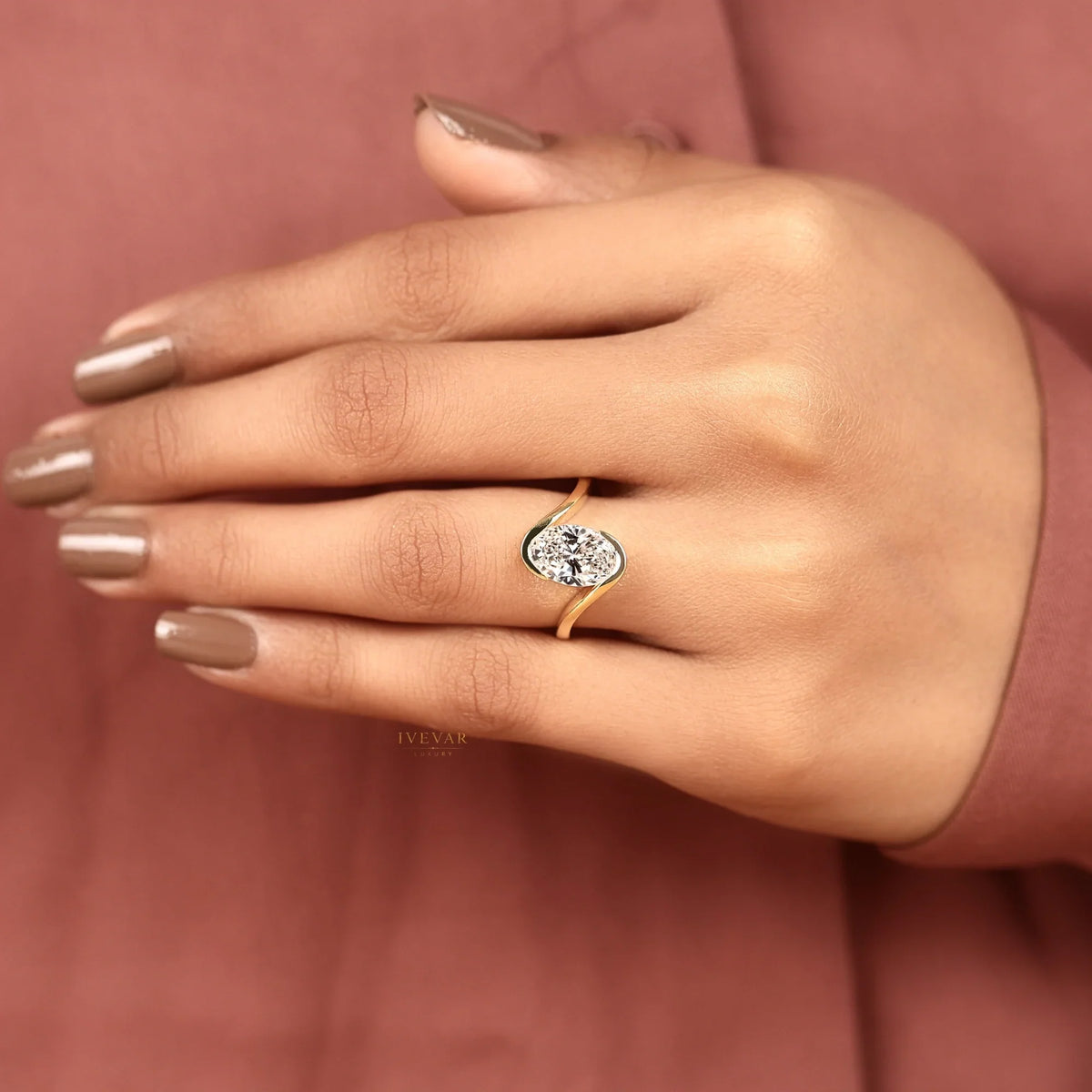 oval cut lab diamond bypass ring with half bezel setting - view 6