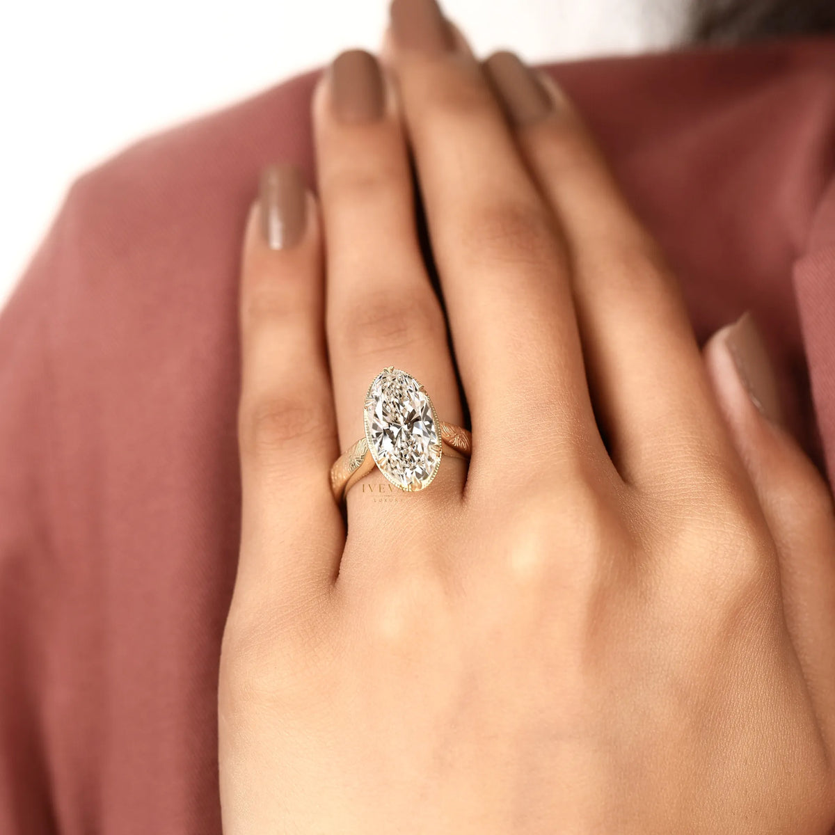 Vintage Oval Cut Moissanite Solitaire Diamond Ring with Engraved Band - View 6