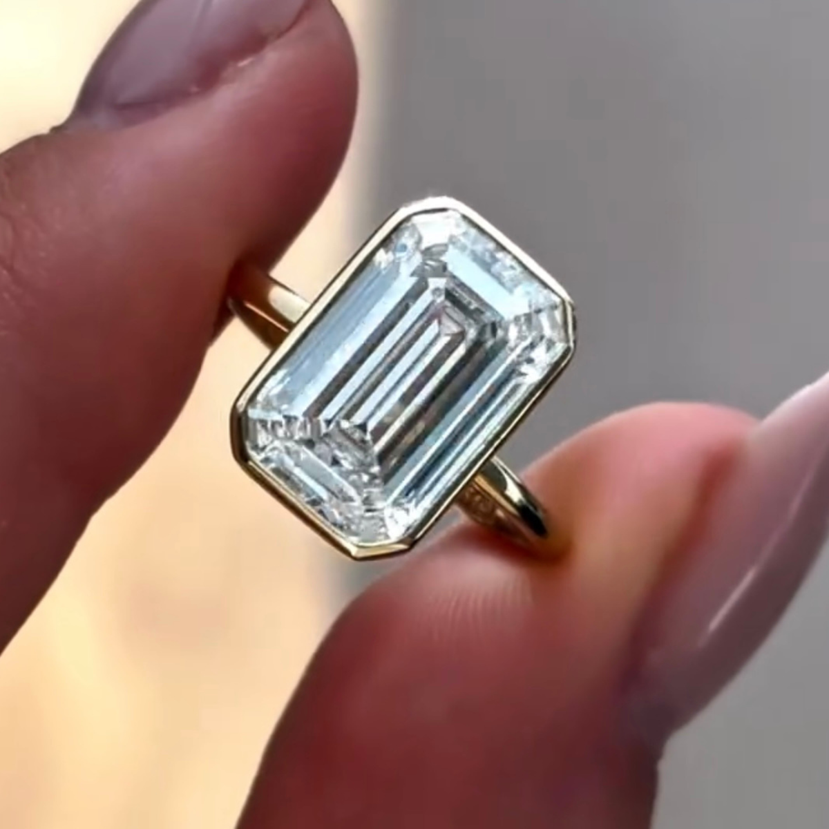 emerald cut lab diamond bezel solitaire engagement ring