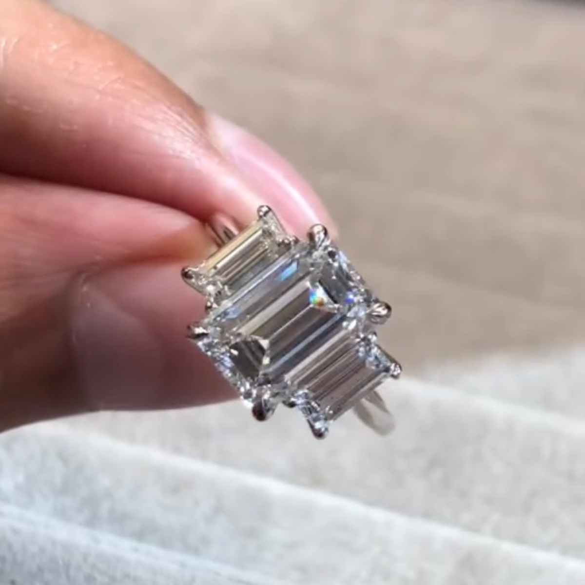 emerald lab diamond three stone wedding ring