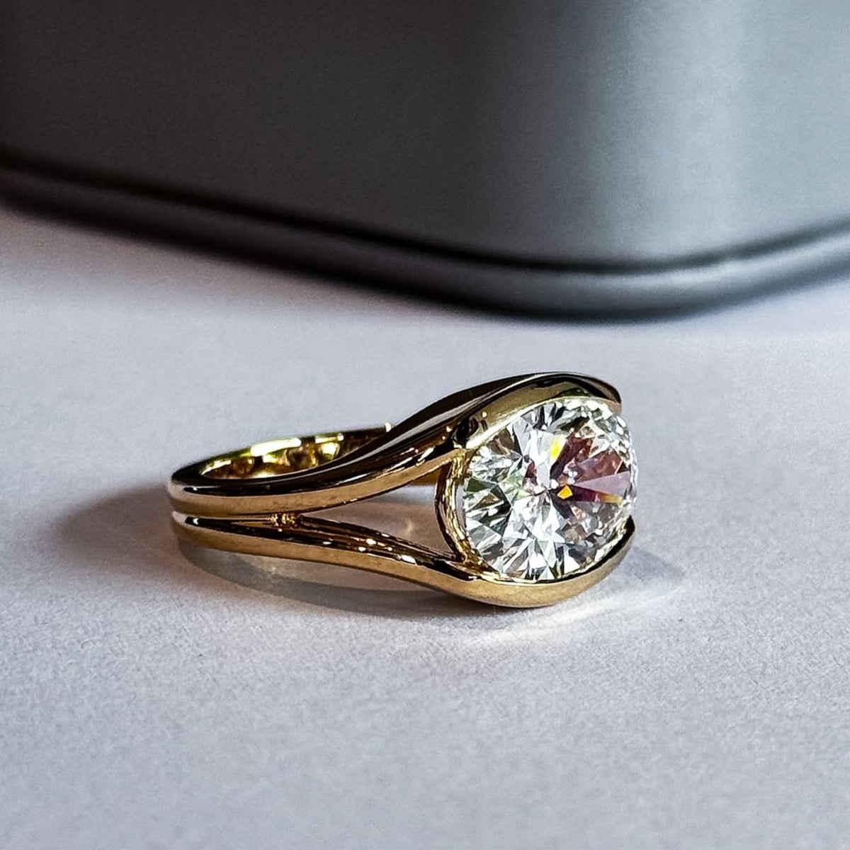 oval cut bezel set moissanite diamond solitaire ring - view 2