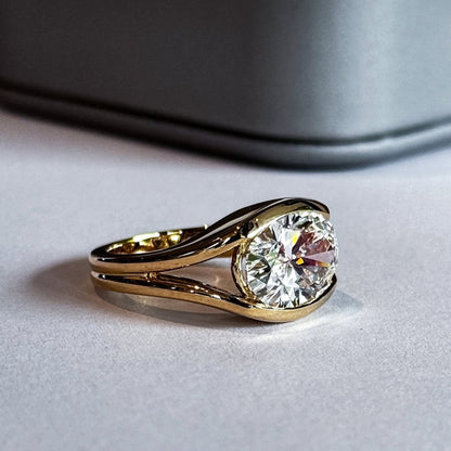 Oval Cut Bezel Set Moissanite Diamond Solitaire Ring - View 2