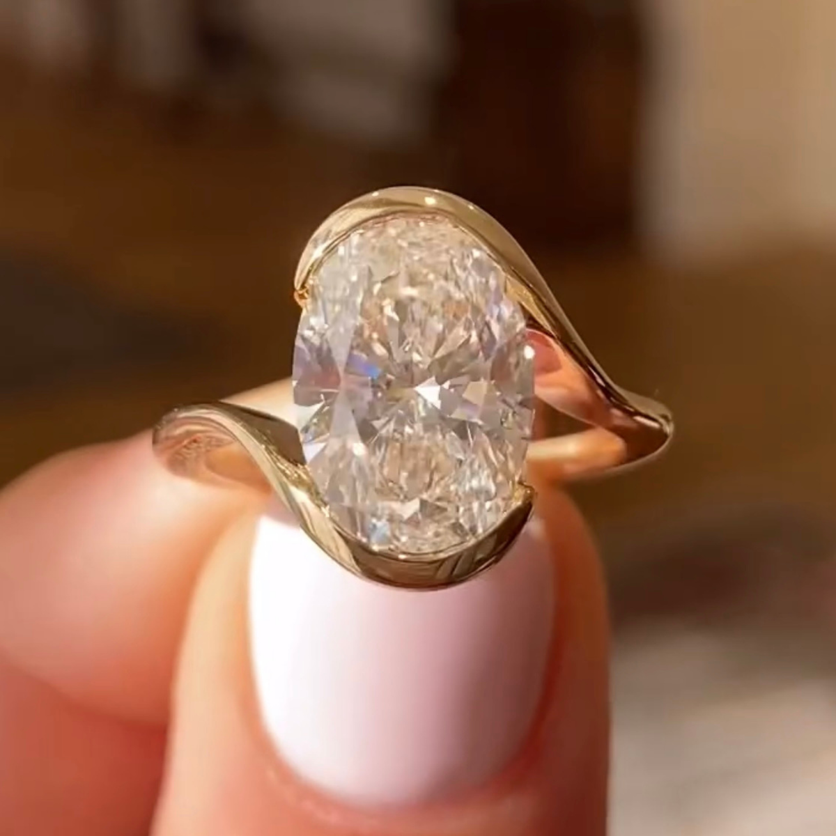 oval lab diamond bypass solitaire engagement ring