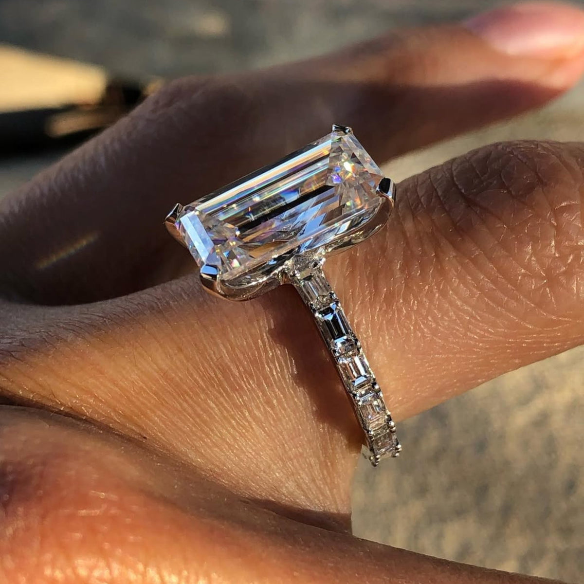 emerald cut moissanite diamond engagement ring with baguette sides - view 3